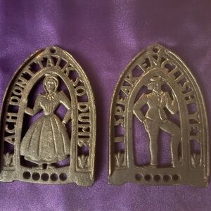 Vintage Cast Iron Pair Trivet Man Woman I Speak English Ach Don’t Talk So Dumb